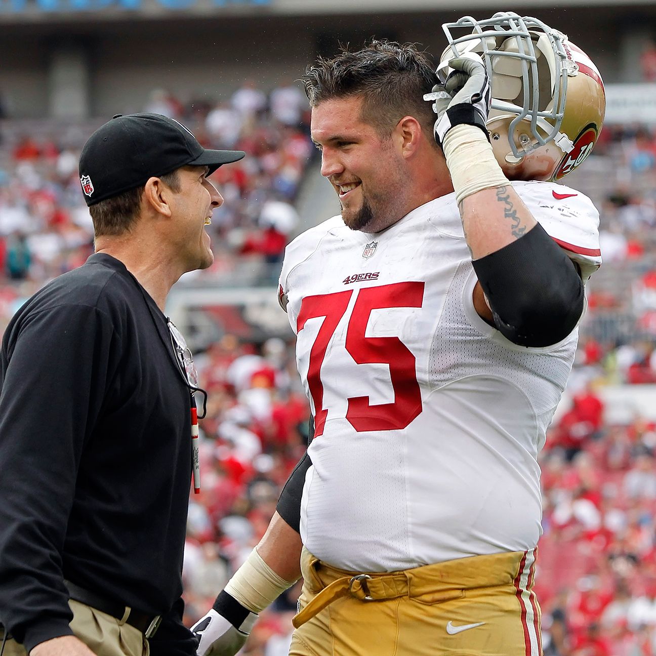 Boone and Harbaugh during happier times.