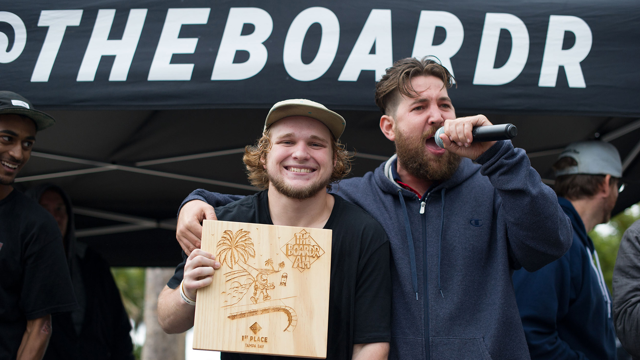 Jamie Foy (left) celebrates his Boardr Am win in 2015 with Boardr announcer Scotty Conley (right).