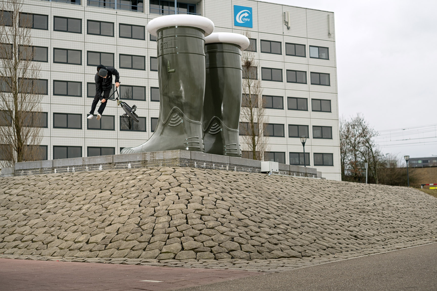 Argentinian Iki Mazza downside tailwhips into a rough bank at the first spot of the day while getting the boot in Venlo, the Netherlands. This was shot back in March this year during a trip he made through Europe. -- Aaron Zwaal
