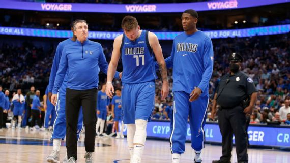 Casey Smith, Luka Doncic and Dirk Nowitzki