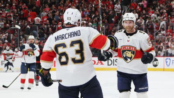 Brad Marchand and Sam Bennett skate together