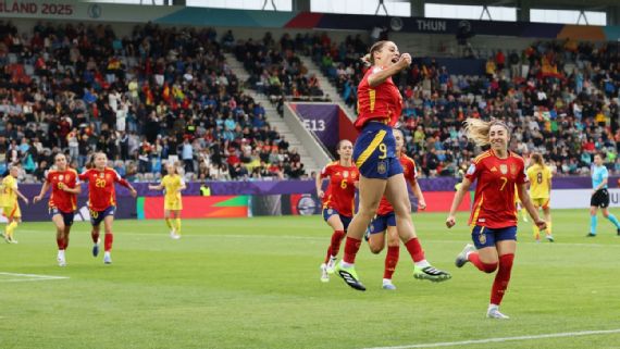 Esther Gonzalez celebrates scoring Spain's third goal against Belgium.