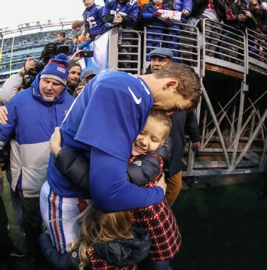 Eli Manning Poses with Kids in Rare Shoot, Shares Which Sport He Coaches