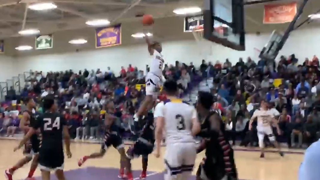 High schooler steps over opponent after devastating dunk ESPN Video
