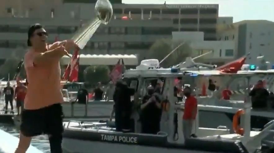 Brady tosses the Lombardi Trophy to another boat - ESPN Video