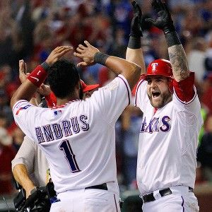 2011 World Series -- Texas Rangers catcher Mike Napoli strikes to