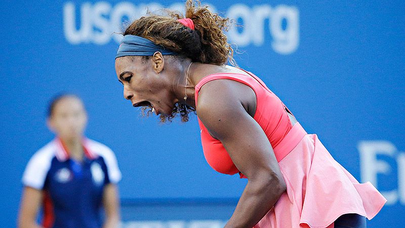 Serena Williams throws her racket after losing the second set tiebreak to  Victoria Azarenka of Belarus in the Woman's Final in Arthur Ashe Stadium at  the U.S. Open Tennis Championships at the