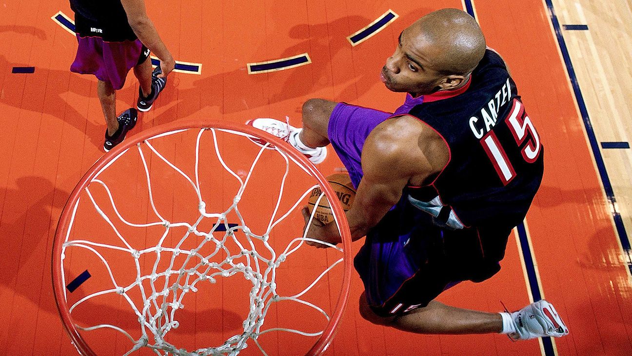 The New Jersey Nets player Vince Carter goes and hits a huge dunk!