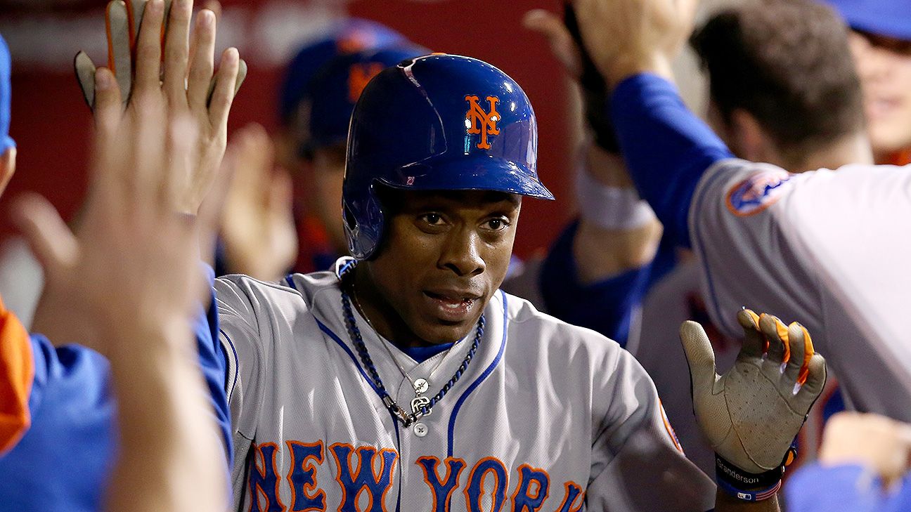 Curtis Granderson of New York Mets touched by fan during game