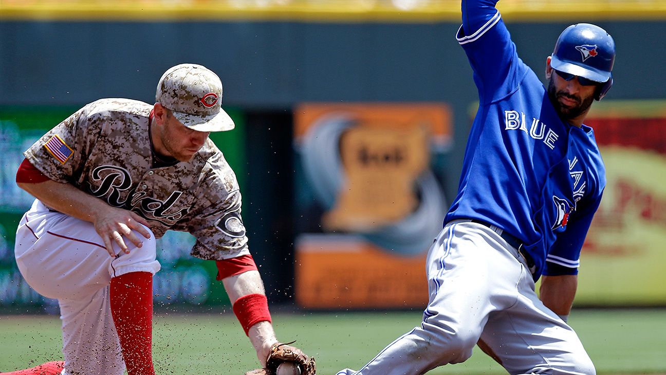 Munenori Kawasaki and Jose Bautista of the Toronto Blue Jays