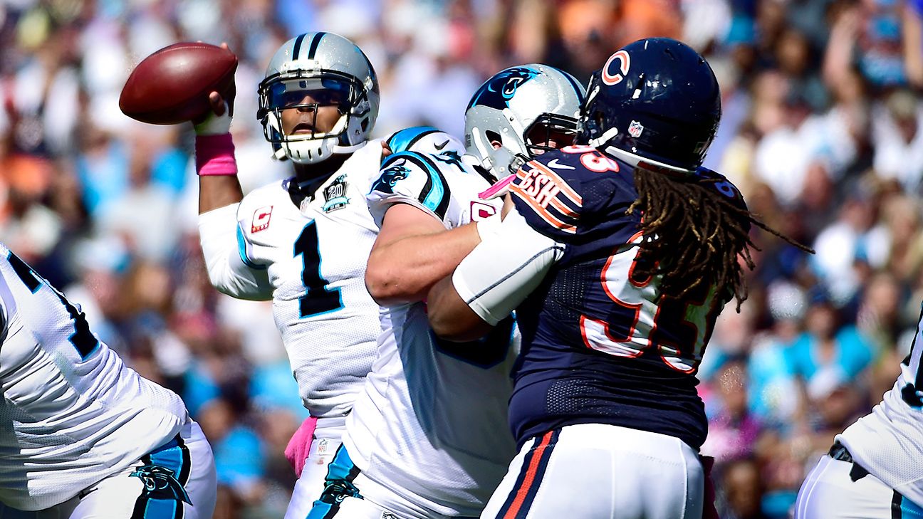 Carolina Panthers quarterback Cam Newton (1) leads a huddle during