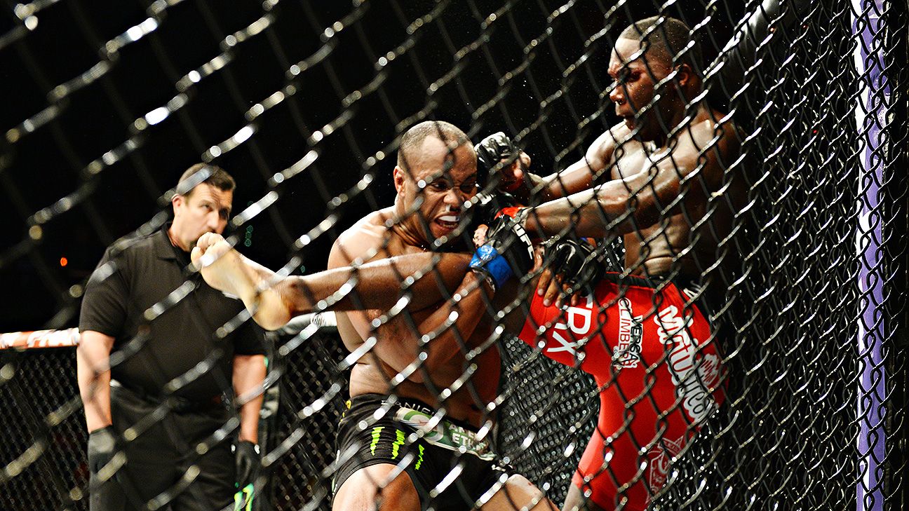 Daniel Cormier wins light heavyweight title by submission, calls out ...
