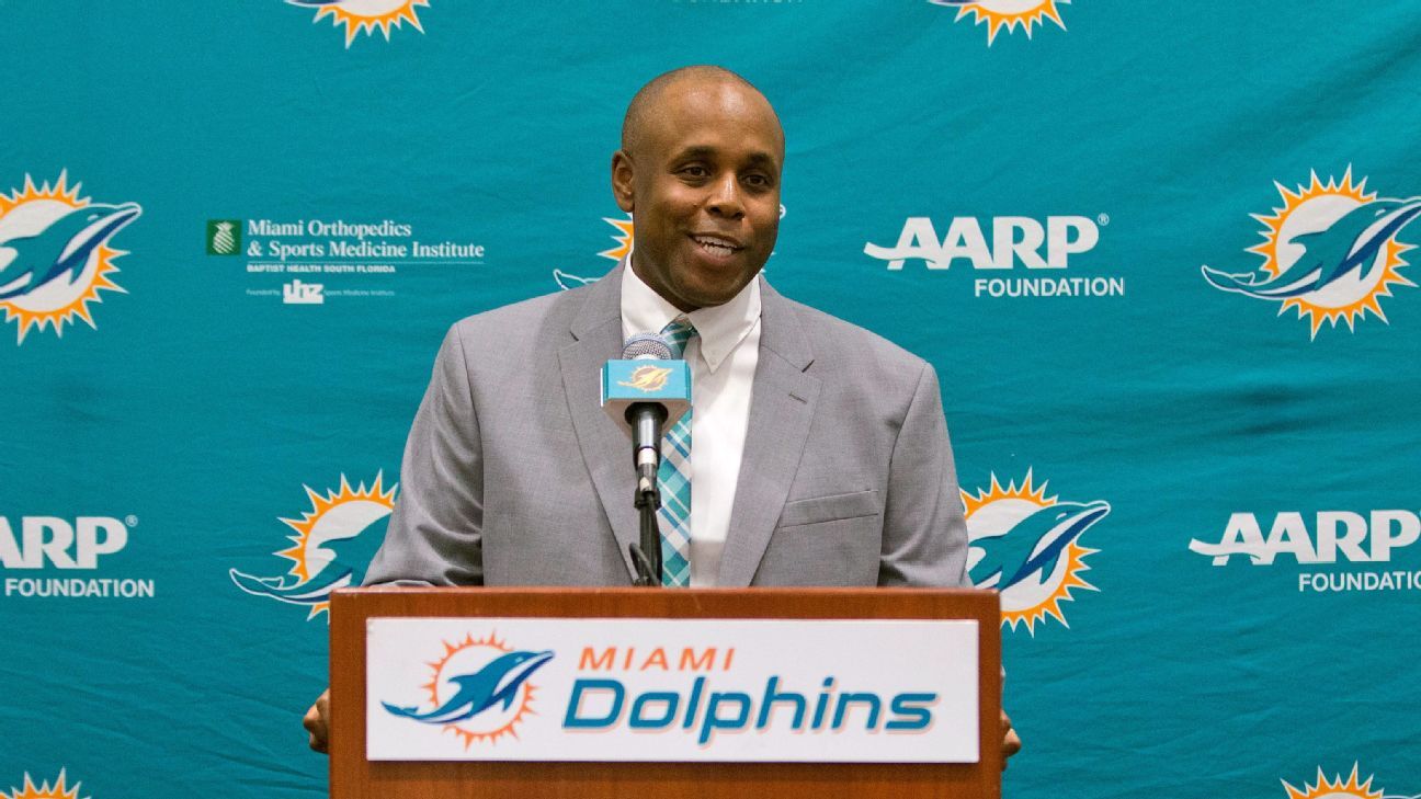 Dolphins GM Chris Grier reacts to his brother Mike Grier making