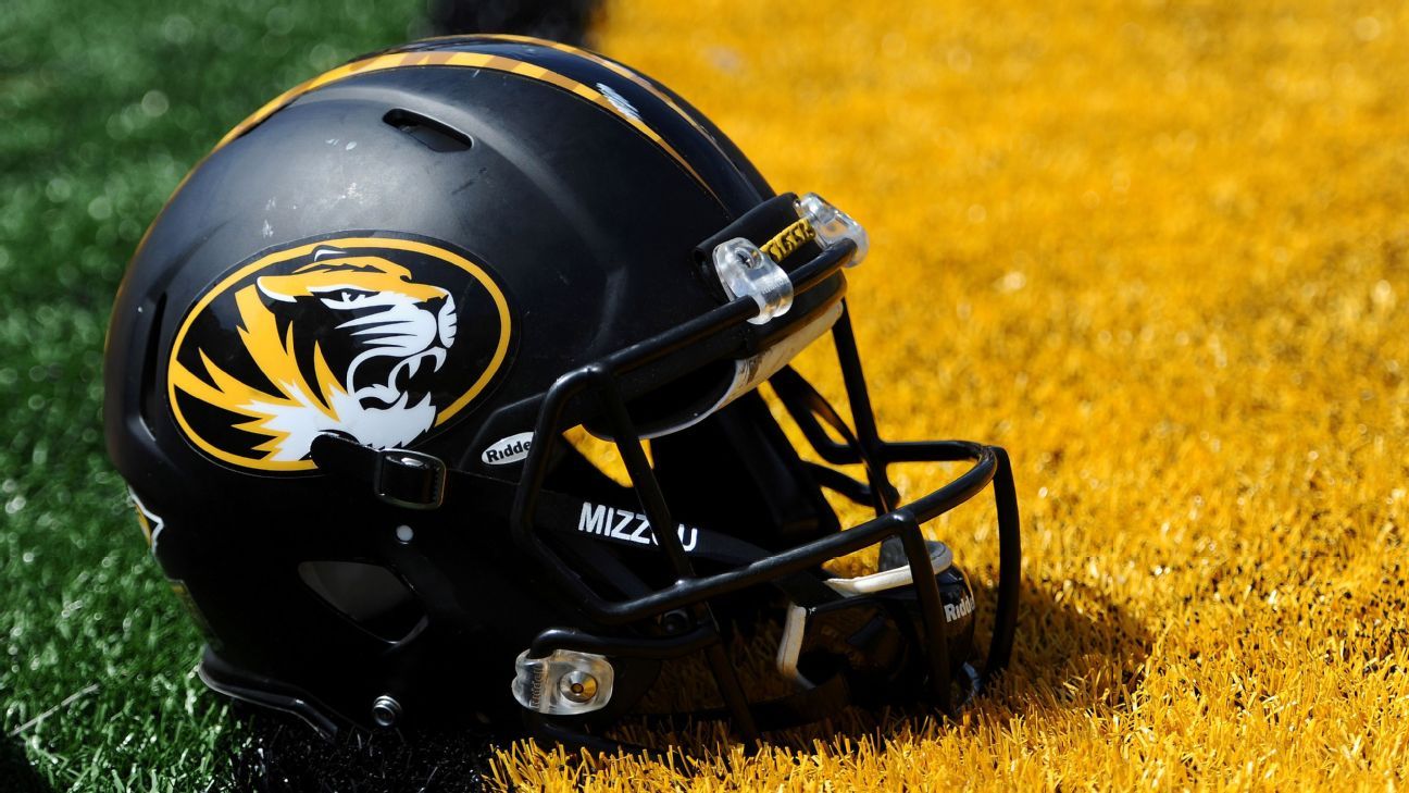 Missouri football players register to vote after leading march