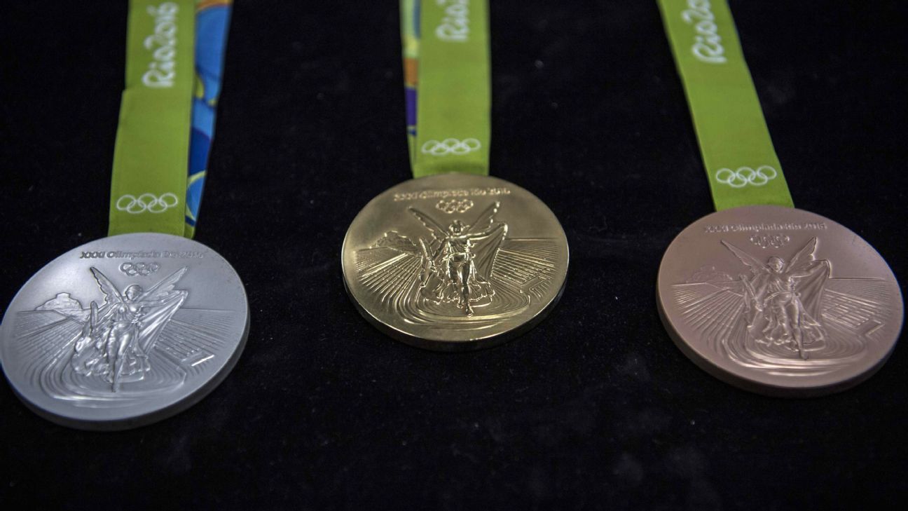 What athletes do with their Olympic medals - Stash them, sell them ...