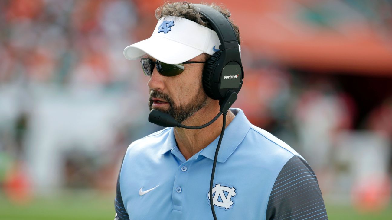 UNC football coach Larry Fedora gives student a ride to graduation
