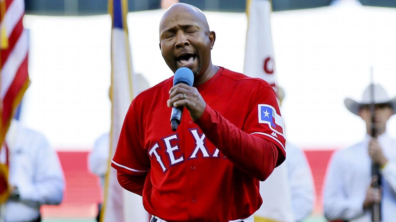 Cancerfree Texas Rangers coach Tony Beasley celebrates with singing