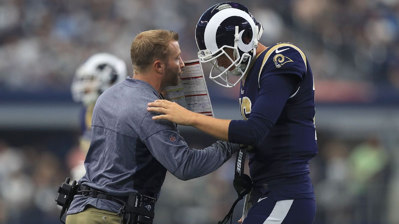 Los Angeles Rams head coach Sean McVay hands the NFC Championship trophy to  Rams quarterback Jared Goff (16) after beating the New Orleans Saints in  overtime at the Mercedes-Benz Superdome in New