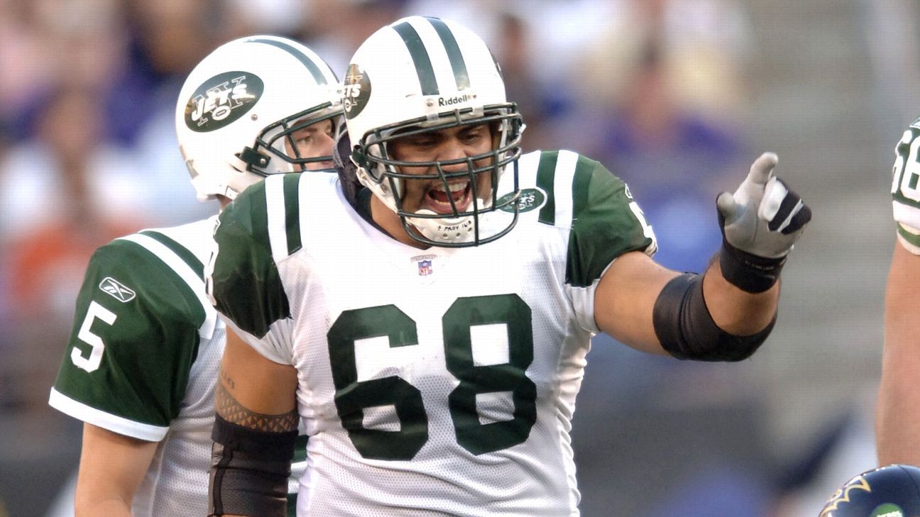 New York Jets center Kevin Mawae watches from sidelines wearing Reebok  Sharktooth cap against the Oakland Raiders. The Jets defeated the Raiders,  27-24, in overtime at Network Associates Coliseum in Oakland, Calif.