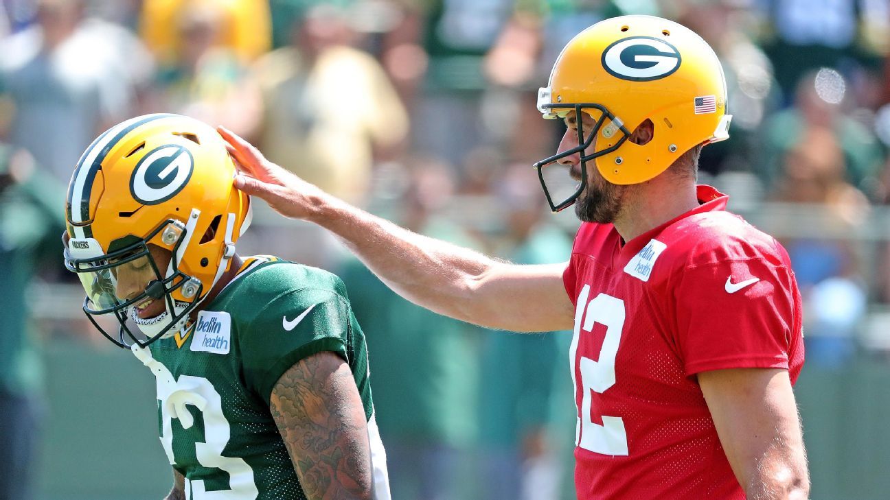 The Green Bay Packers celebrate an interception by Jaire Alexander