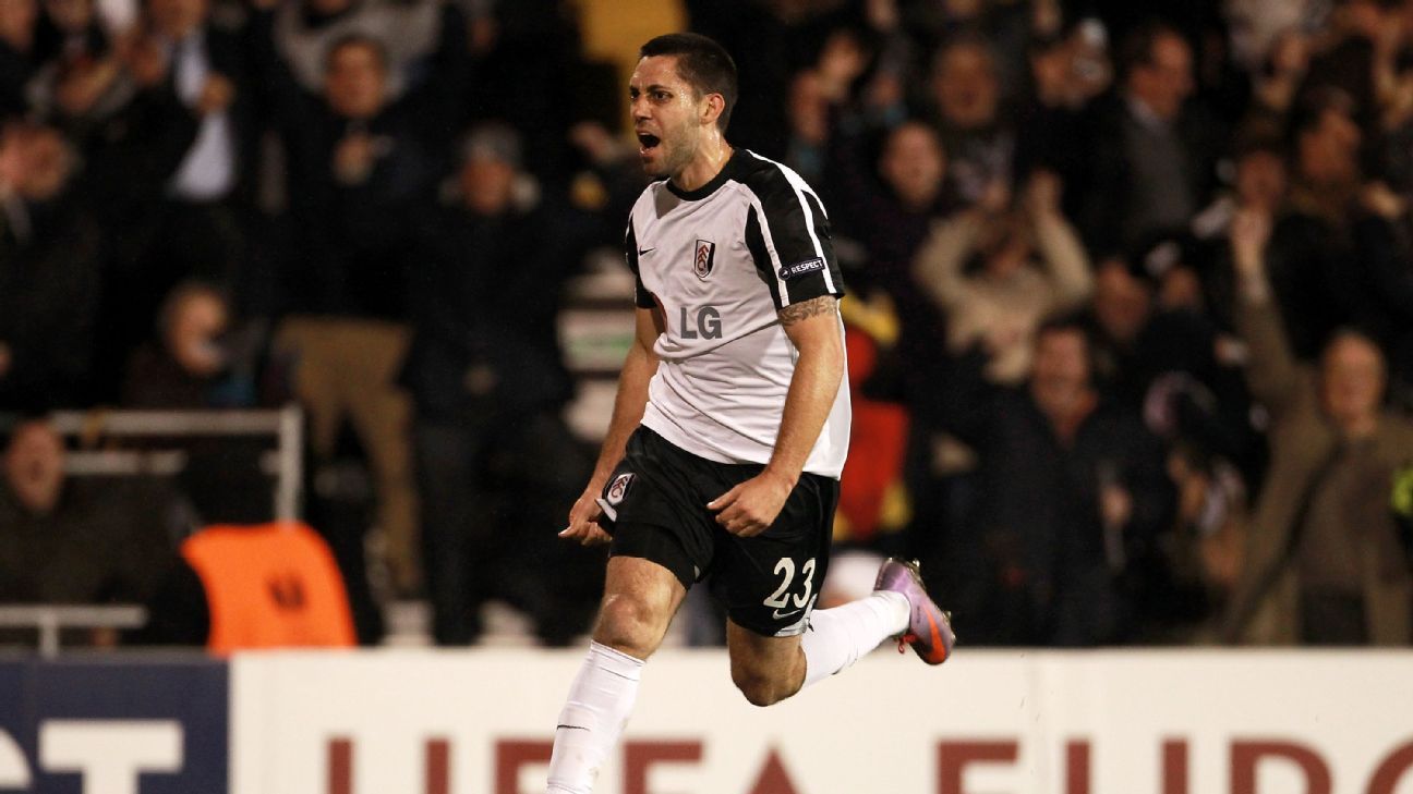 Fulham's Clint Dempsey (left) celebrates after scoring the opening