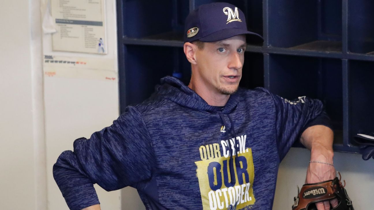 Arizona Diamondbacks' Craig Counsell celebrates with his teammates