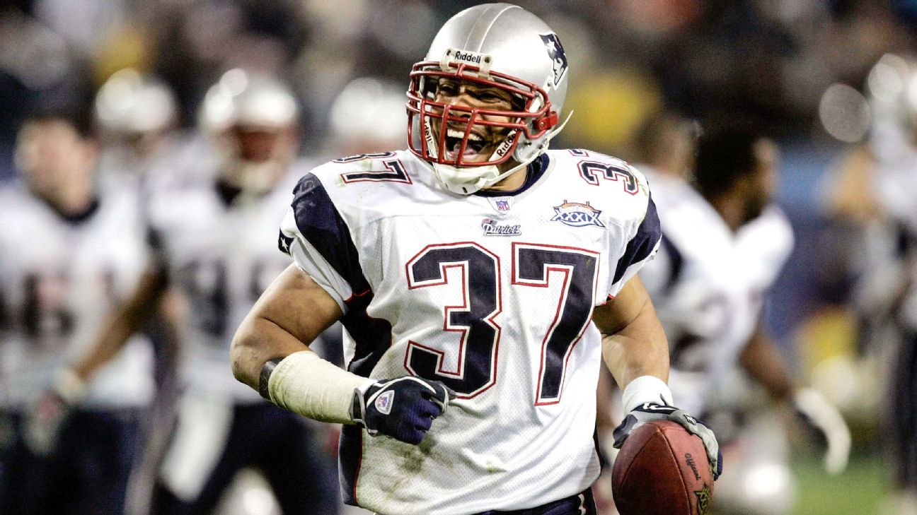 New England Patriots safety Rodney Harrison catches a ball during