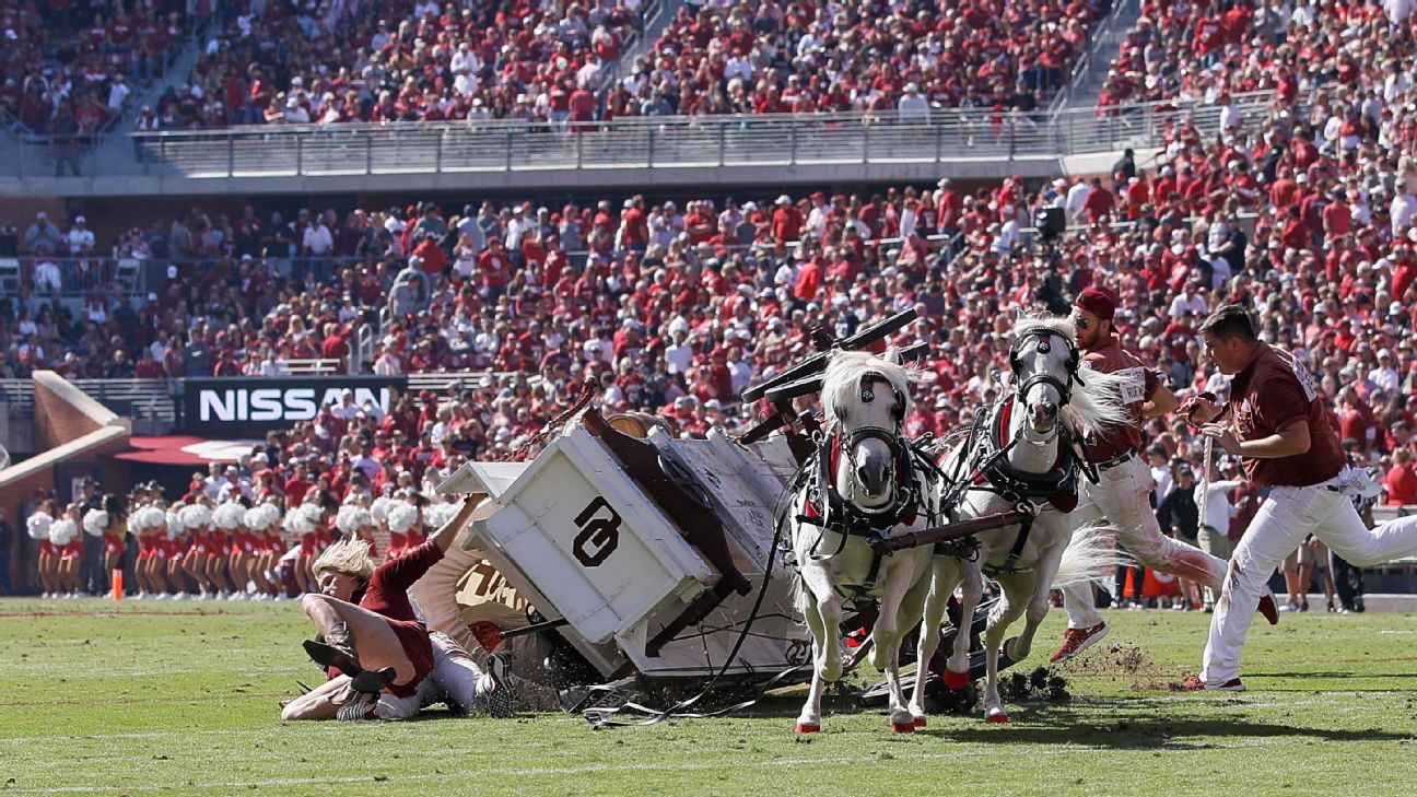 Oklahoma's Sooner Schooner tips over on field, ejects riders ESPN