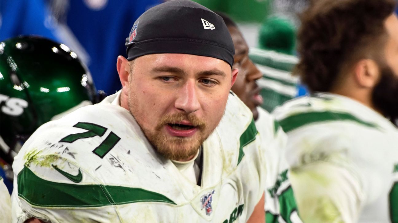 New York Jets offensive lineman Alex Lewis (71) moves to the