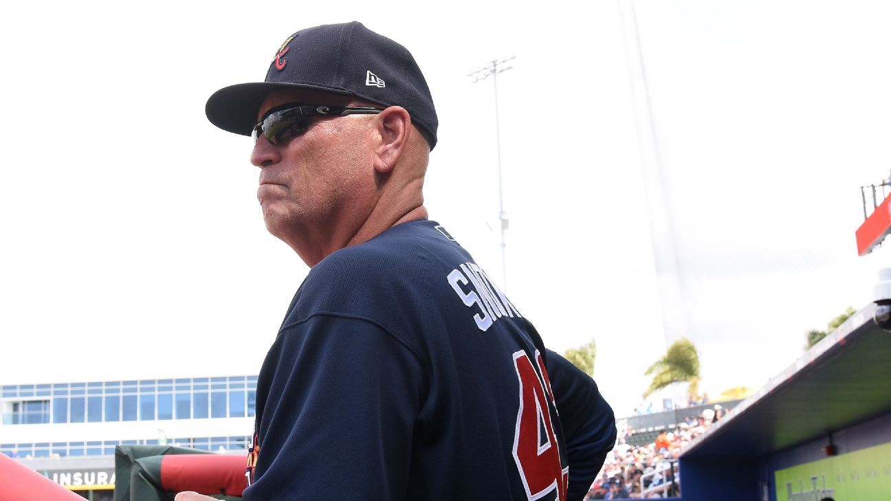 Braves manager has family home after 'hostile' Philly talk.