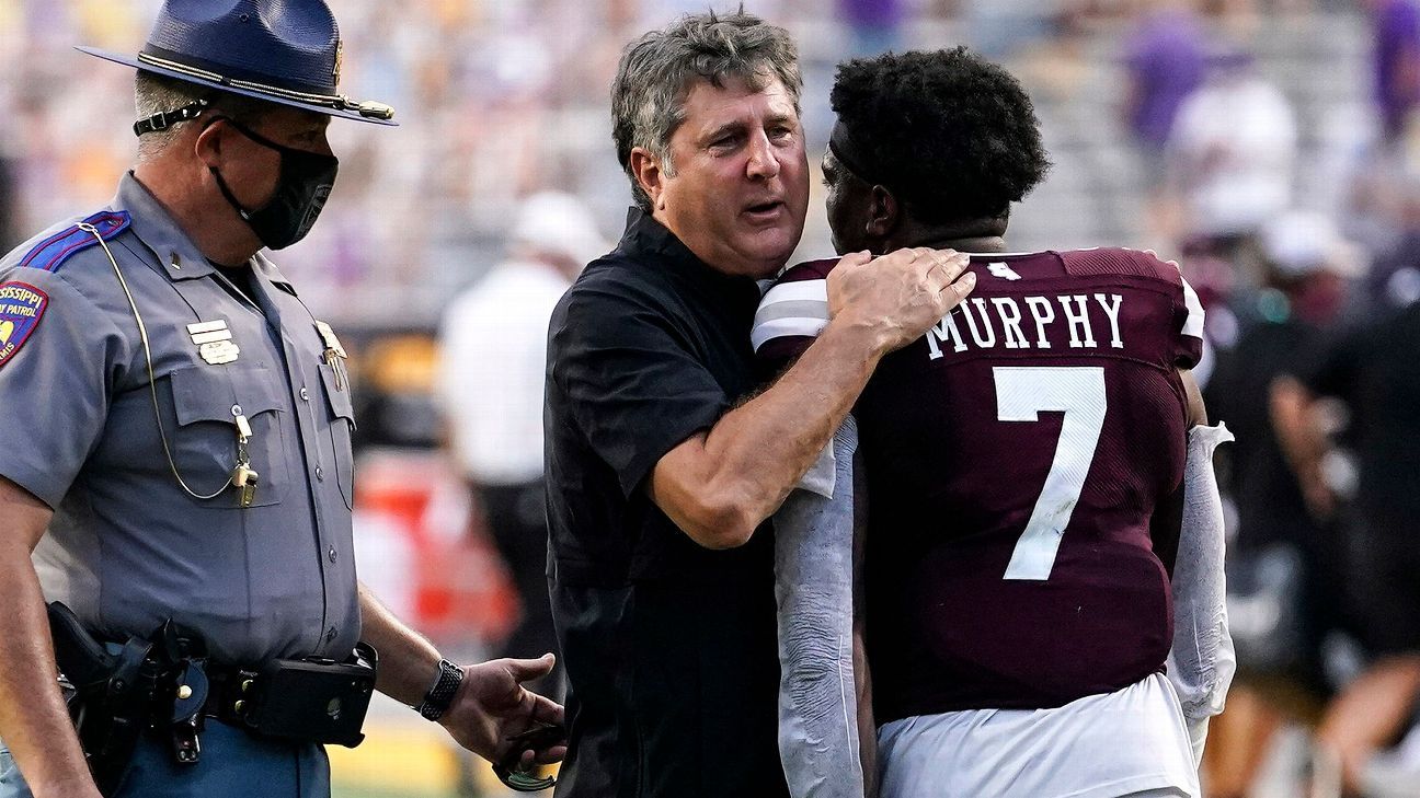 How college football is handling its COVID-19 protocols one month into the season
