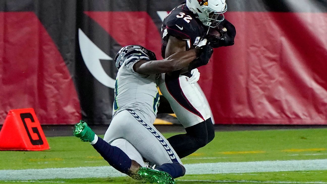 NEW ORLEANS, LA - OCTOBER 09: Seattle Seahawks wide receiver DK Metcalf  (14) heads for the endzone as New Orleans Saints cornerback Paulson Adebo  (29) defends during the football game between the