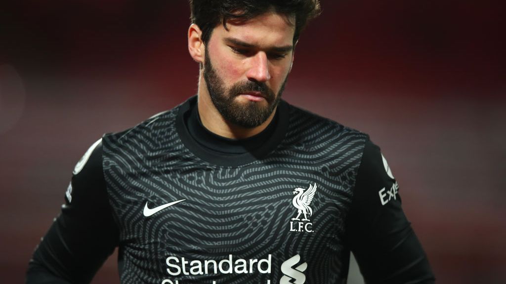 Muere joins Liverpool goalkeeper Alisson Becker