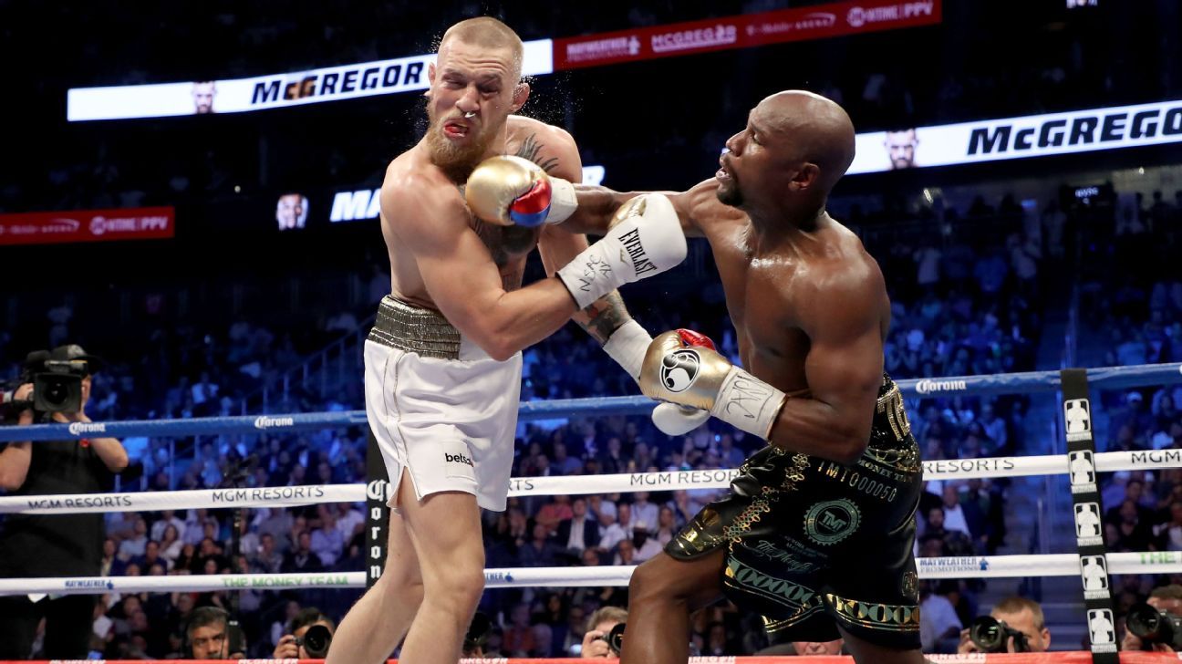 Floyd Mayweather, right, last fought as a pro in a TKO victory over Conor McGregor in August 2017 at T-Mobile Arena in Las Vegas.