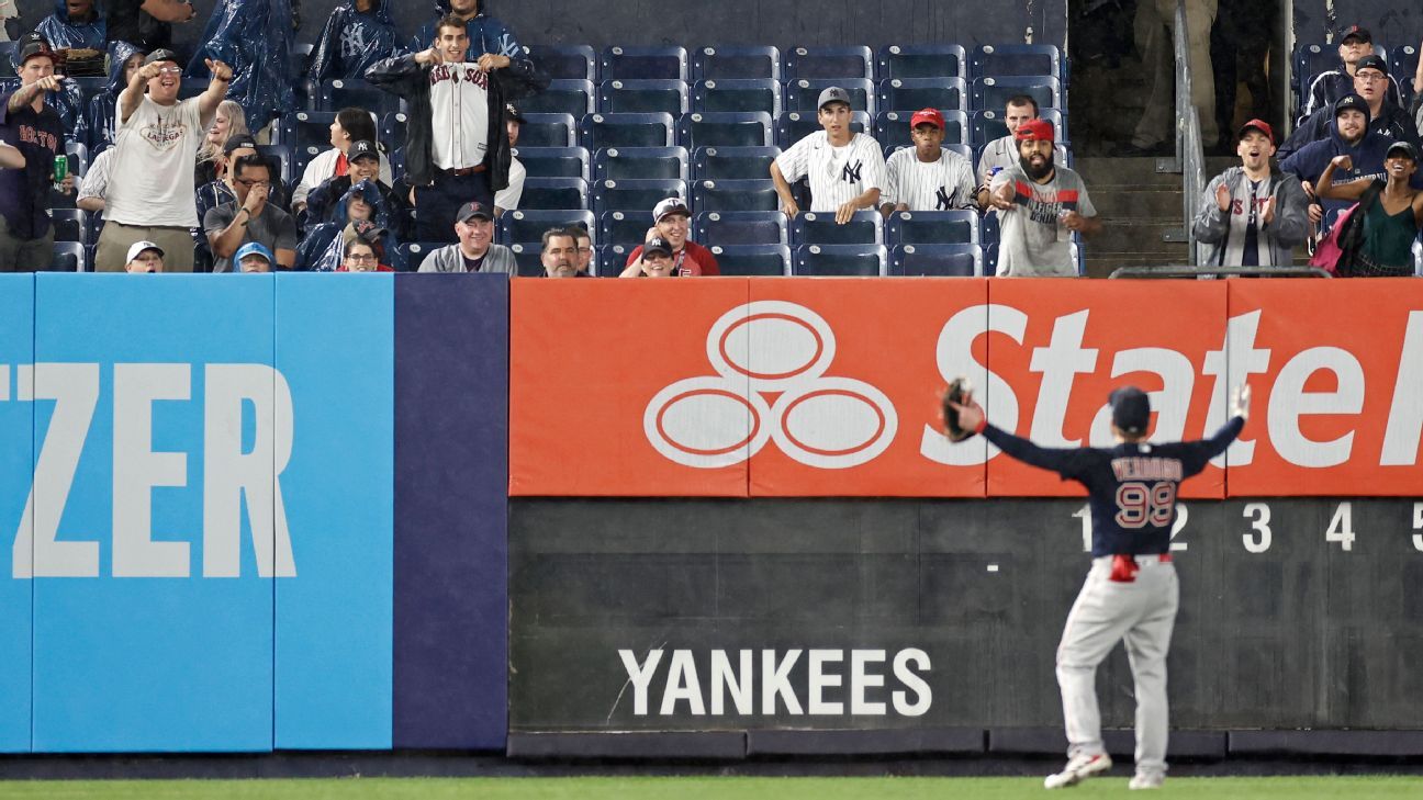 Alex Cora briefly pulls Boston Red Sox off field after fan hits