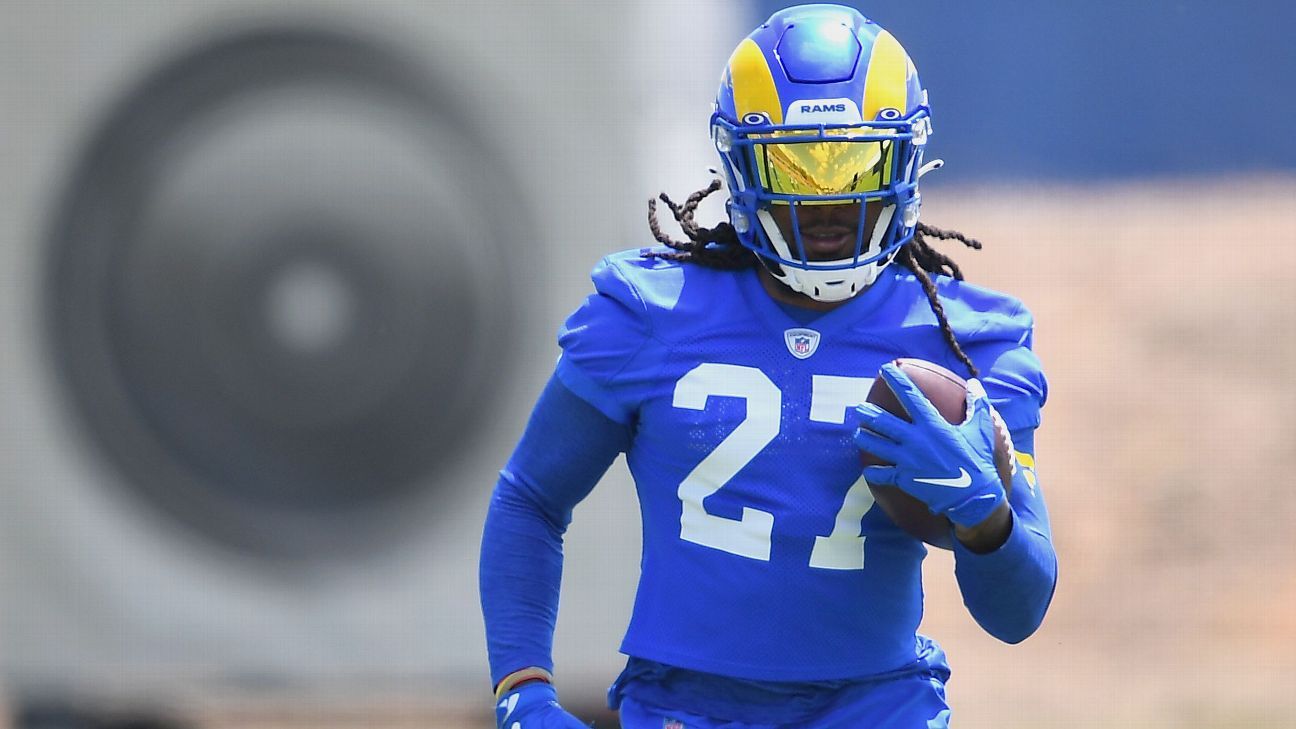 Los Angeles Rams running back Darrell Henderson Jr. pushes over the goal  line for a rushing touchdown