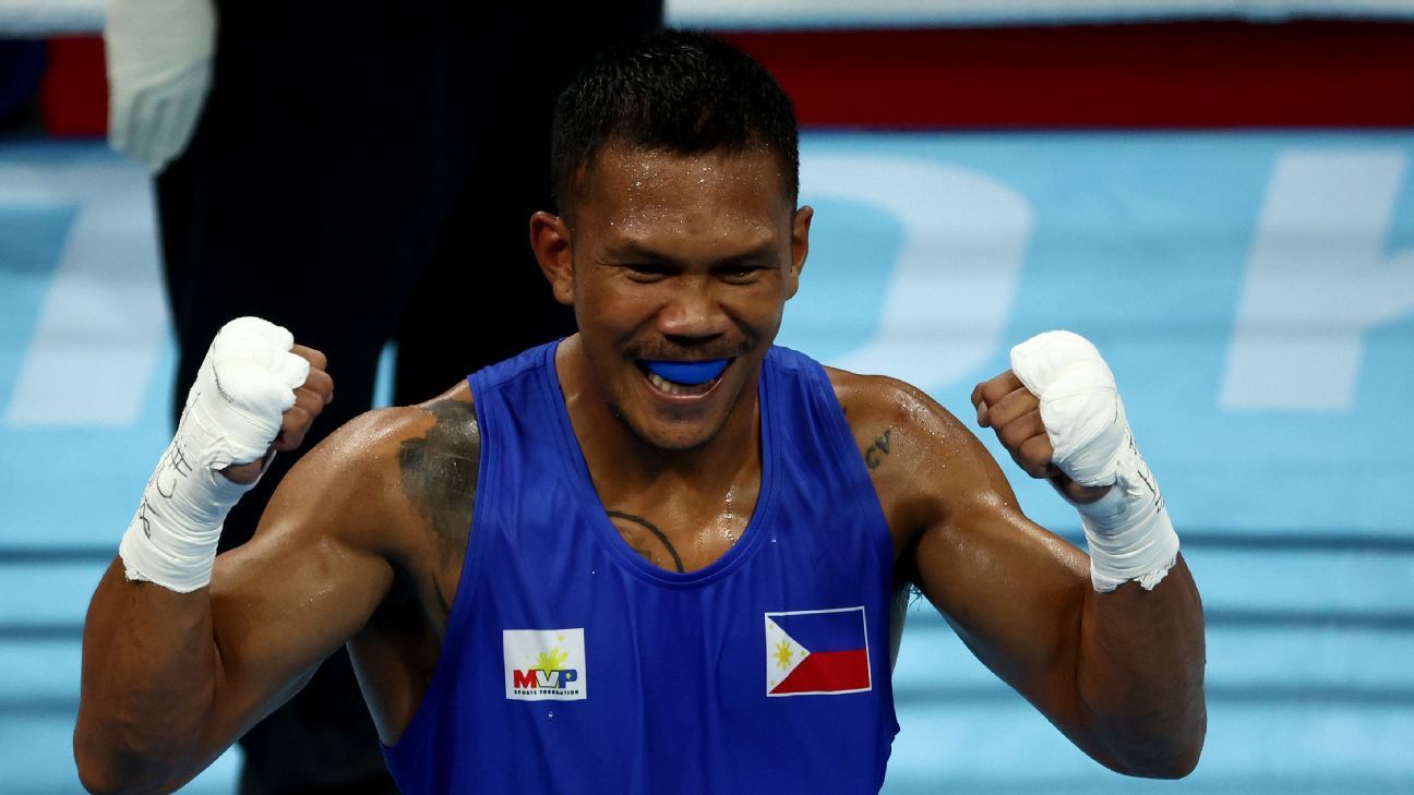 Eumir Marcial smashes his way into medal rounds with ...