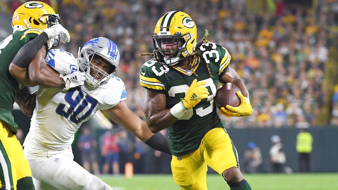 Aaron Jones lives up to big contract with four TDs in Packers' win vs. Lions