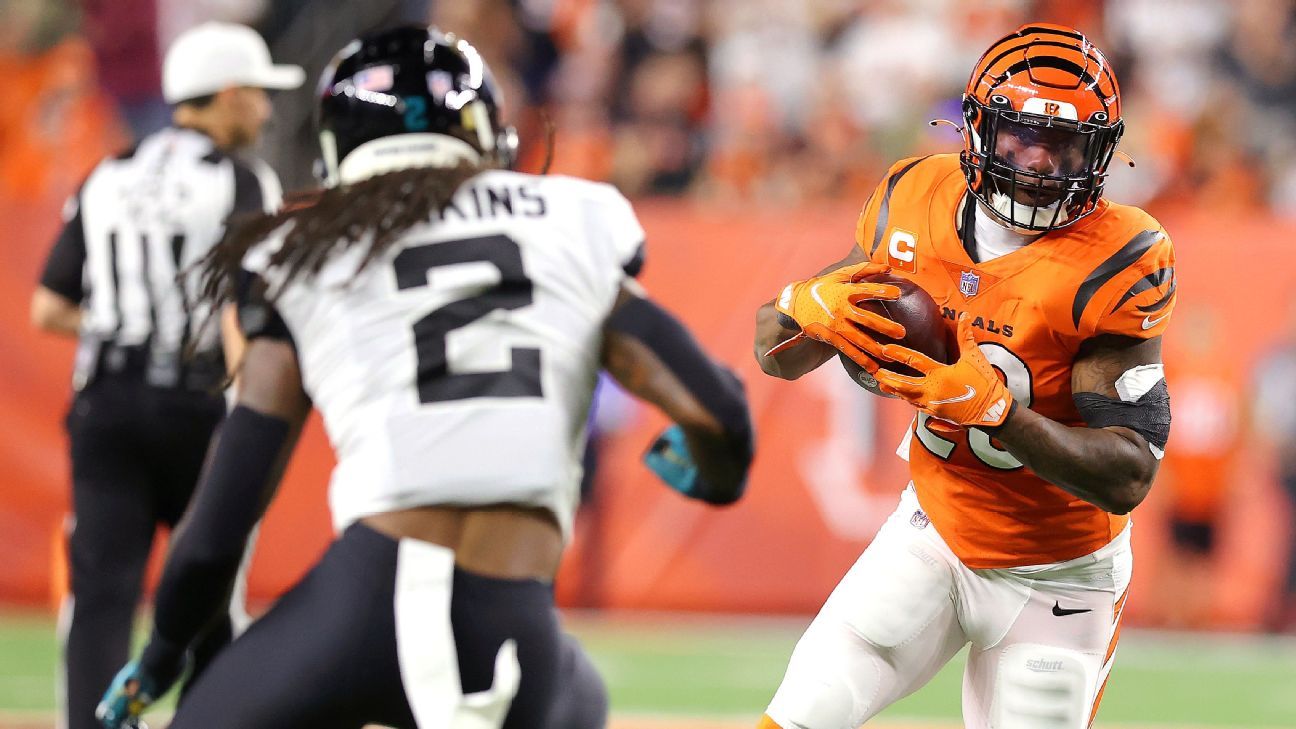 East Rutherford, New Jersey, USA: November 3, 2021, Cincinnati Bengals  running back Joe Mixon (28) gets flipped after making a long run during a  NFL football game against the New York Jets