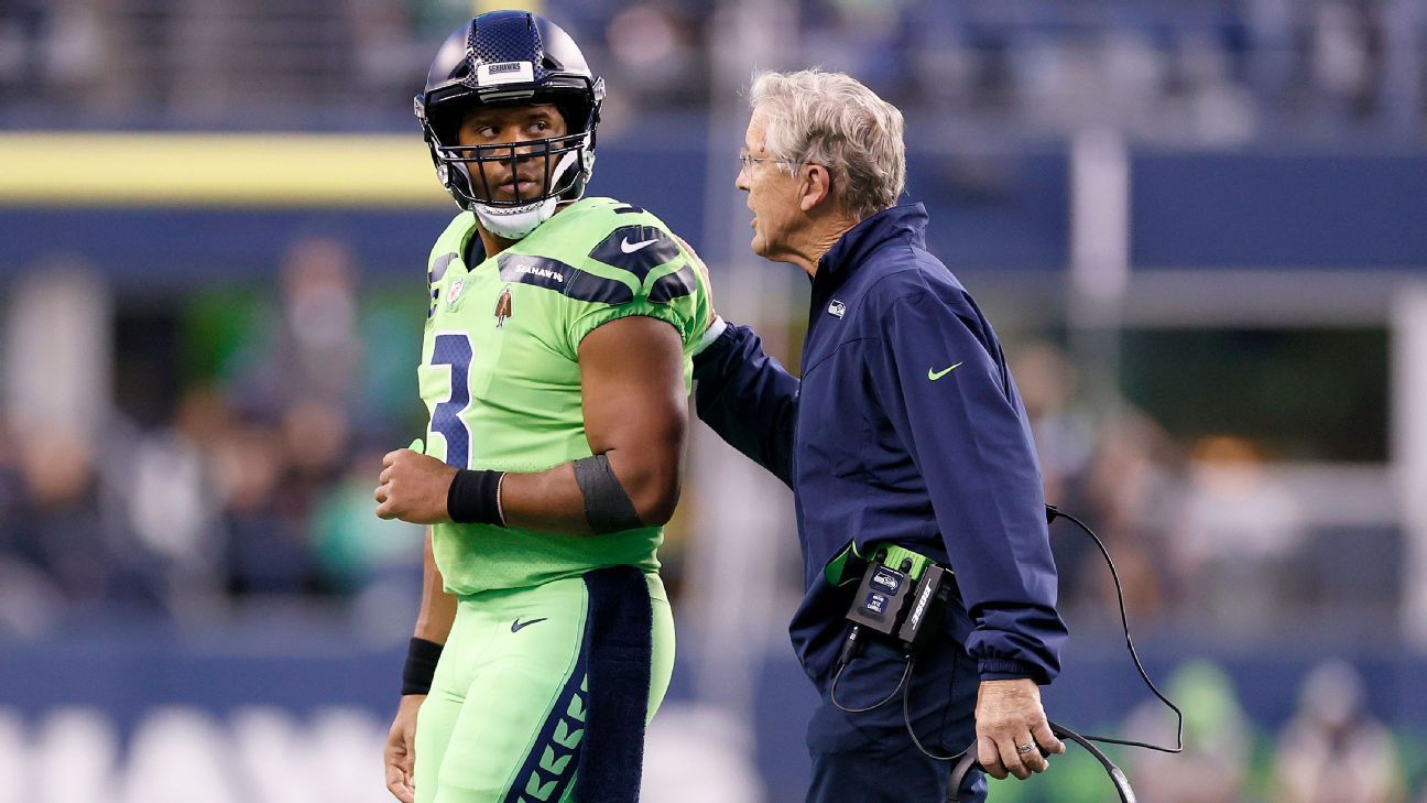 Russell Wilson does Pete Carroll for Halloween -- wig, gum and all