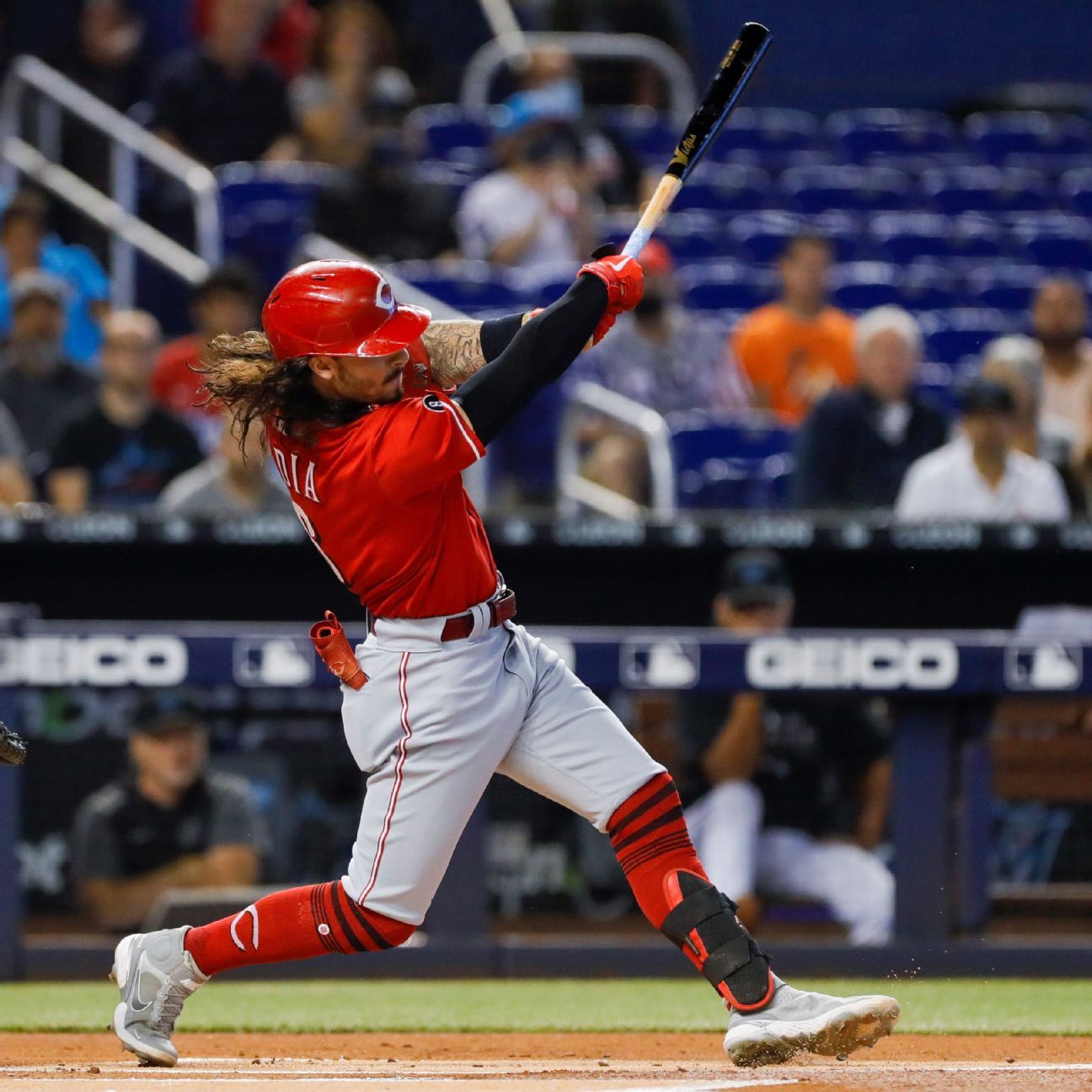 Cincinnati Reds' Jonathan India, left, receives the Major League