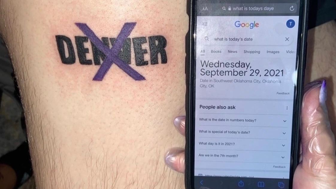 Tigers fan shows off tattoos in Baltimore 