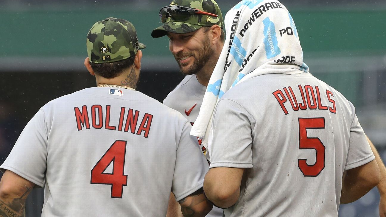 Albert Pujols hits two homers, Yadier Molina makes pitching debut