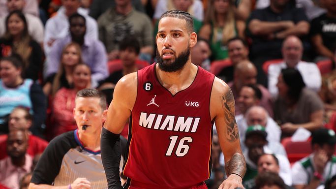 Heat's Caleb Martin tackles Raptors' Christian Koloko into stands