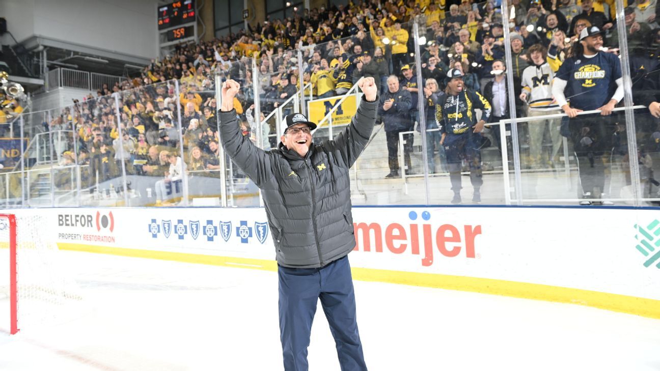 Michigan football celebrates win over Ohio State at hockey game