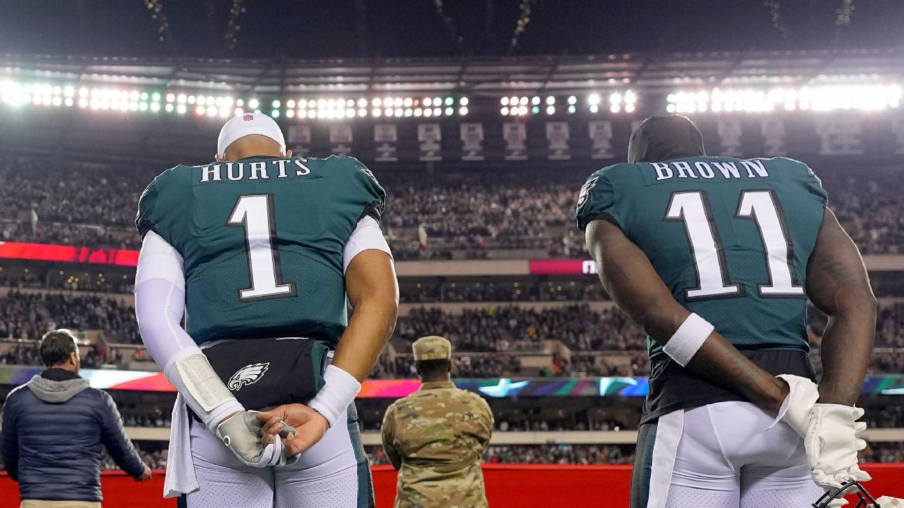 Philadelphia Eagles wide receiver A.J. Brown (11) and quarterback Jalen  Hurts (1) talk after an NFL