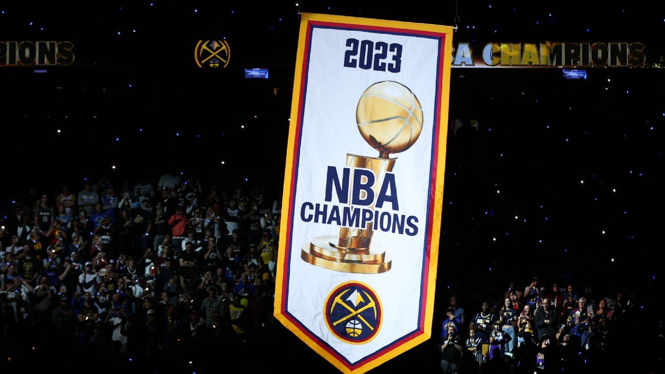 Denver Nuggets receive championship rings, raise banner