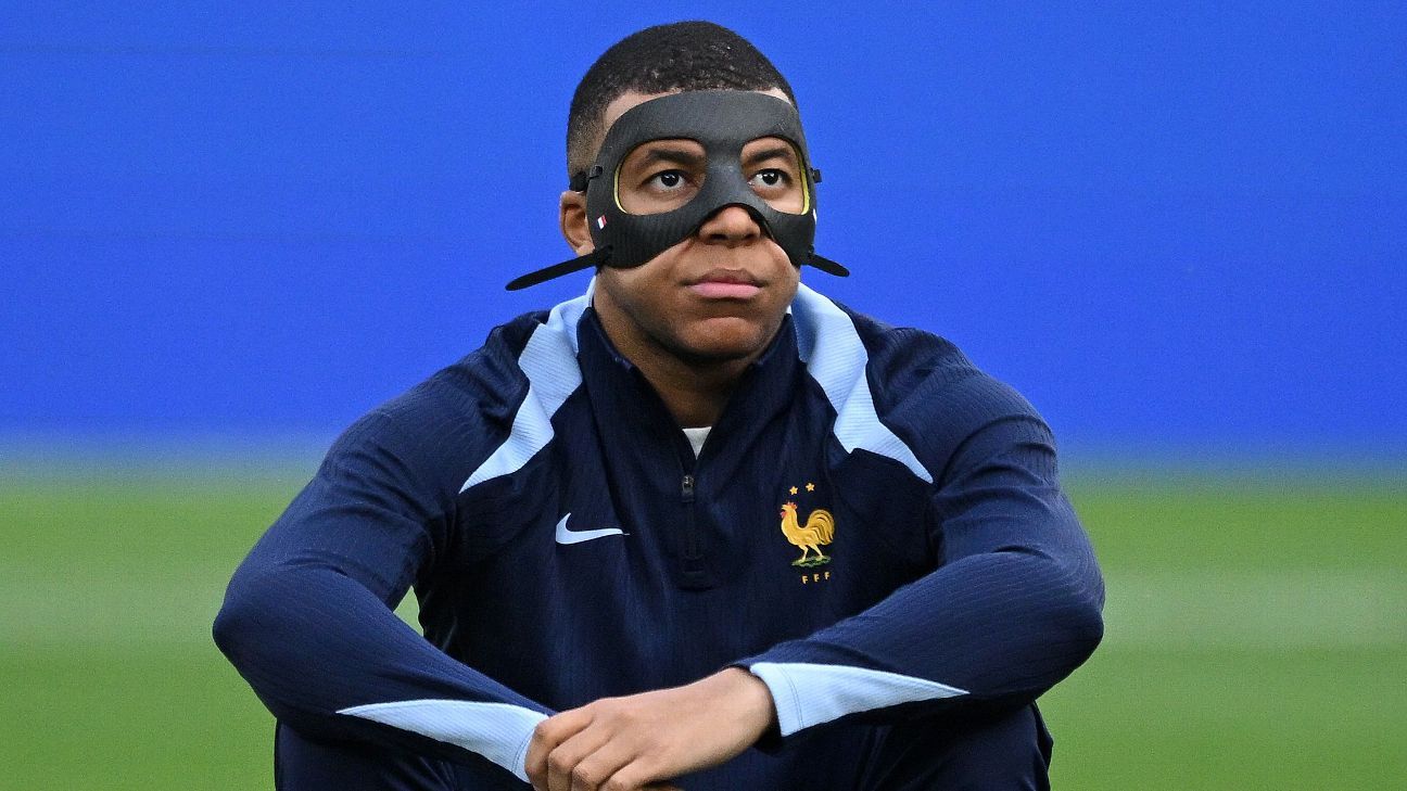 France’s Mbappé to start vs. Poland with mask on