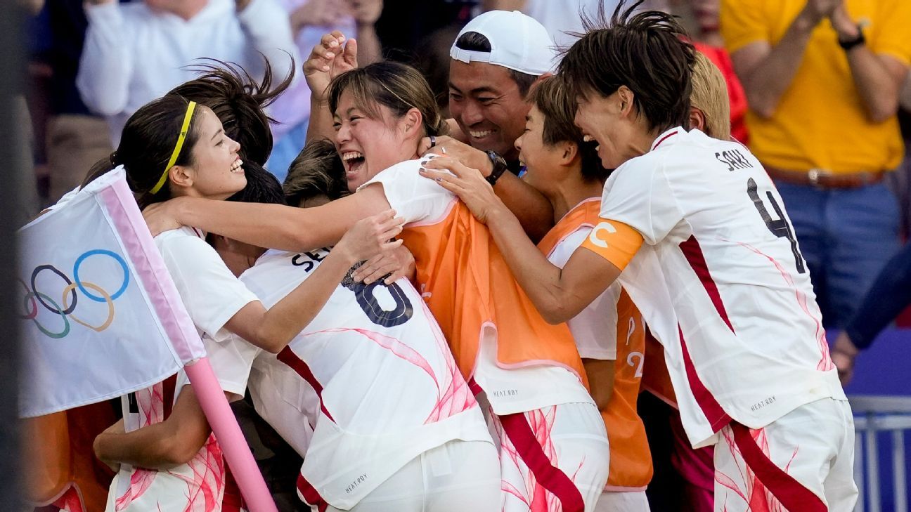 Japan shock Brazil with pair of late strikes