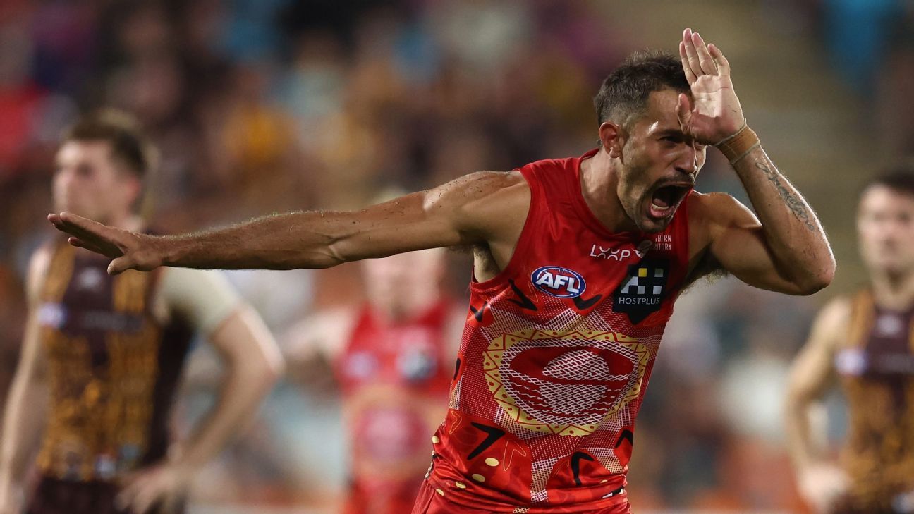 Miller all smiles as Suns hold off Hawks in milestone